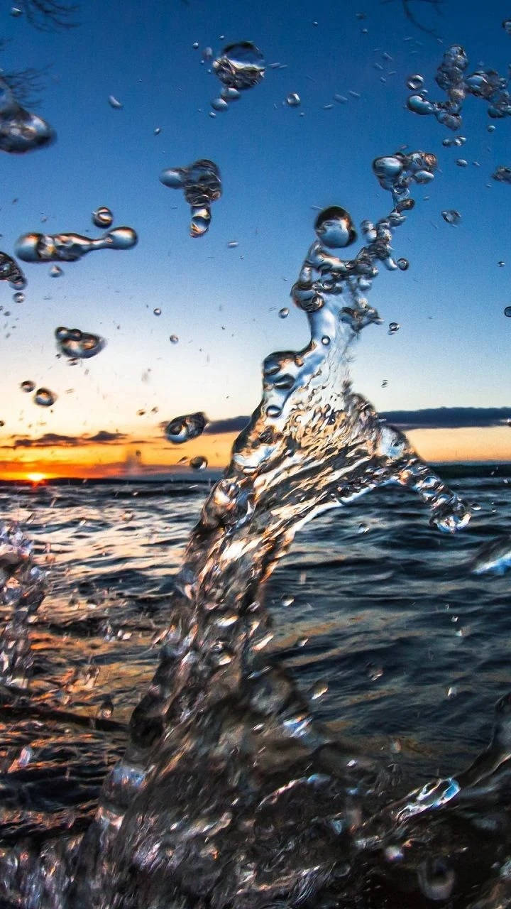 8K iPhone Всплеск воды в морских волнах Обои