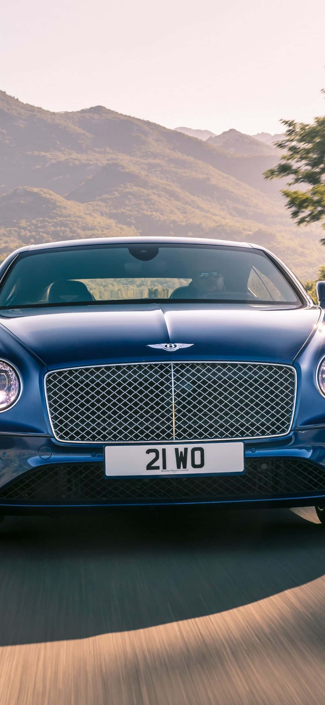 Подпись: Роскошная поездка на Bentley с iPhone Обои