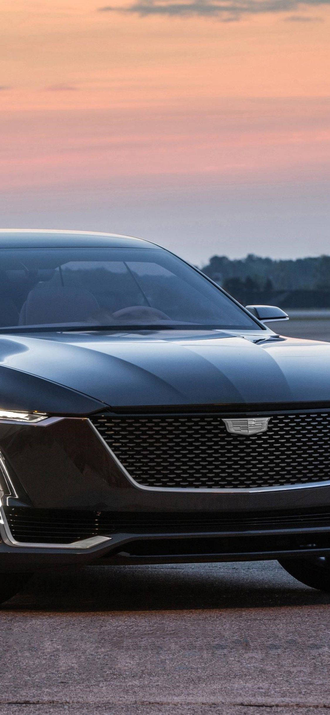 Cadillac на закате с iPhone Обои