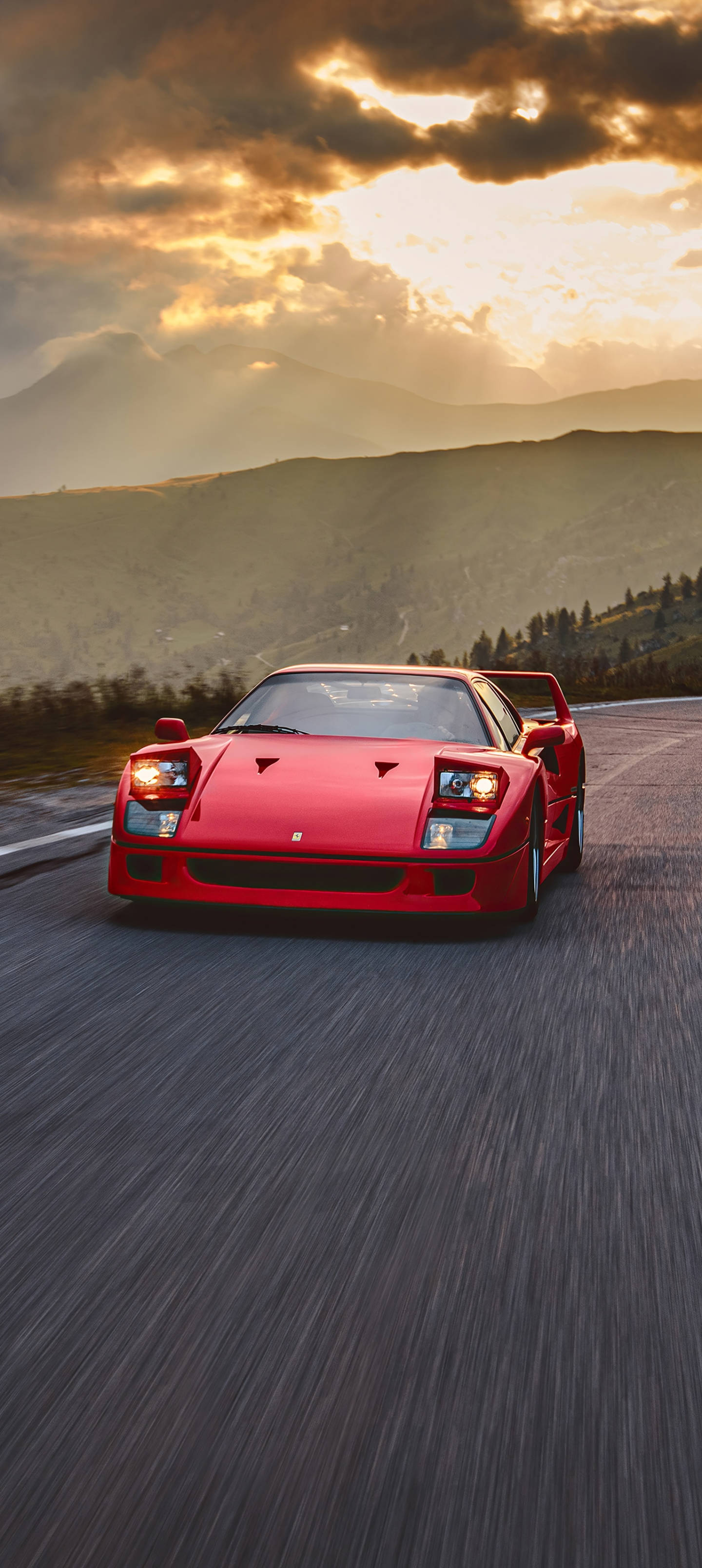 Телефон Ferrari F40 на закате Обои