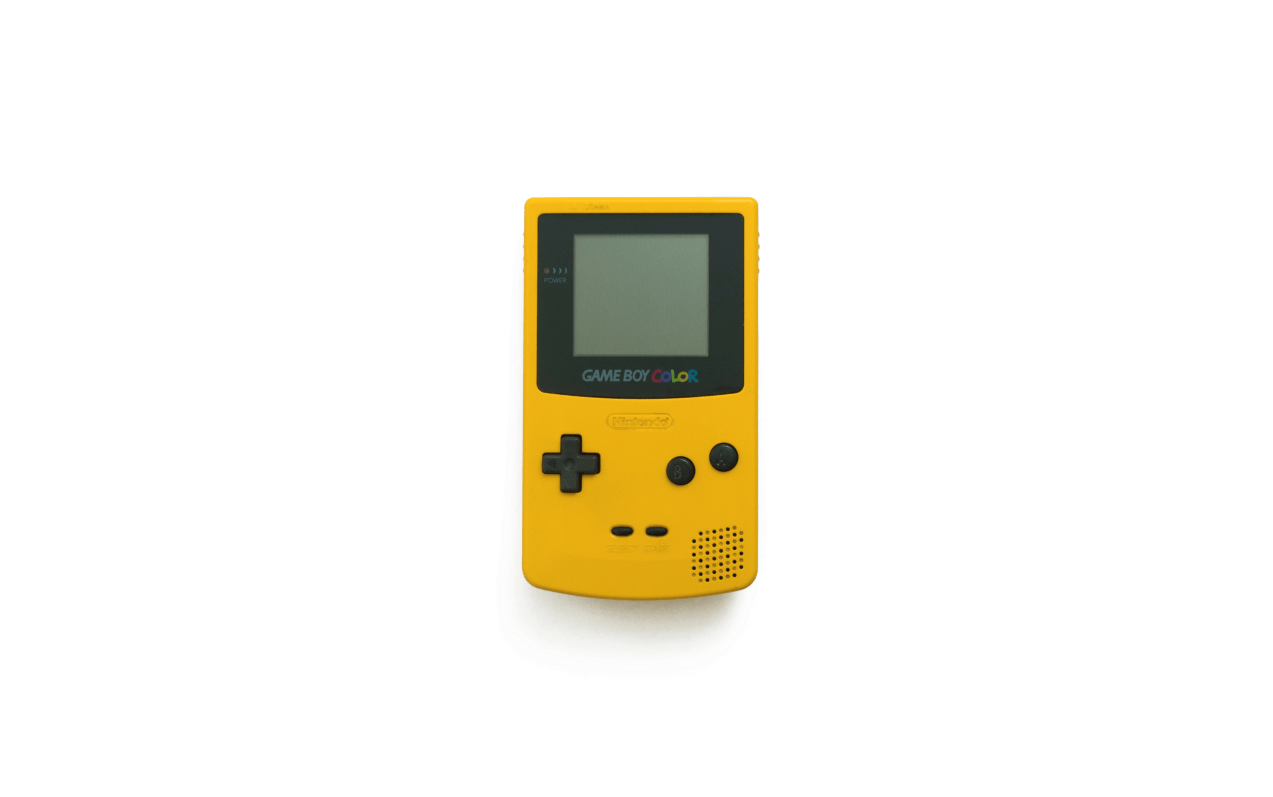 Желтая портативная консоль Game Boy Color Обои
