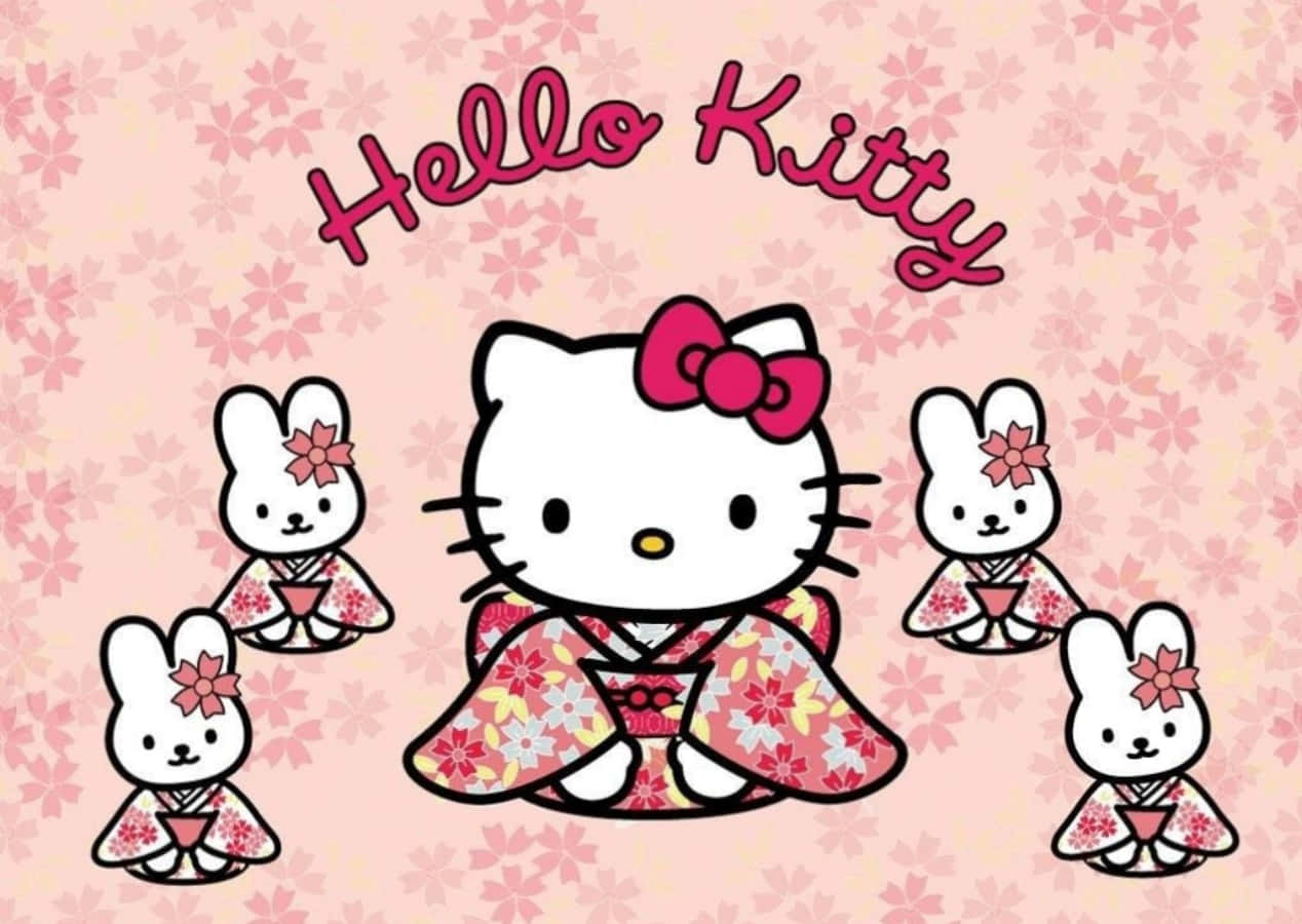 Hello Kitty с ноутбуком и кроликами в кимоно Обои