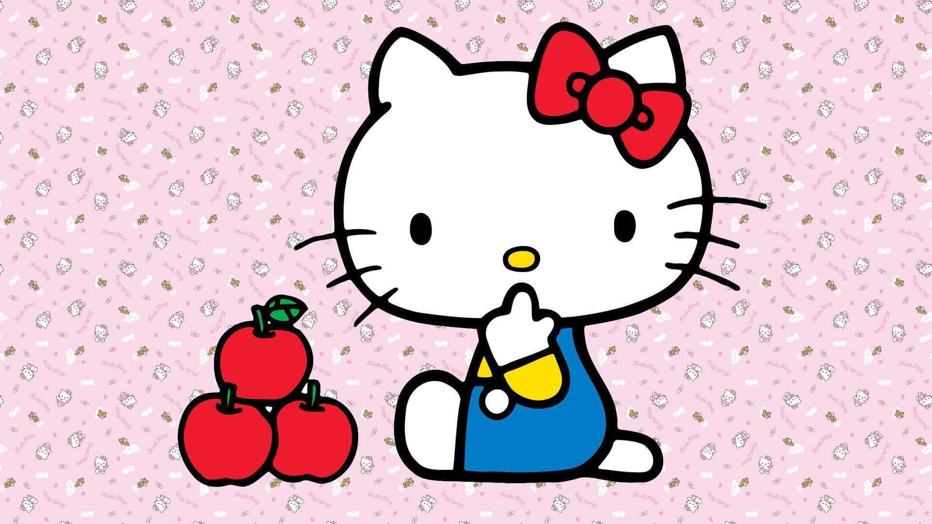 Hello Kitty рядом с яблоками Обои