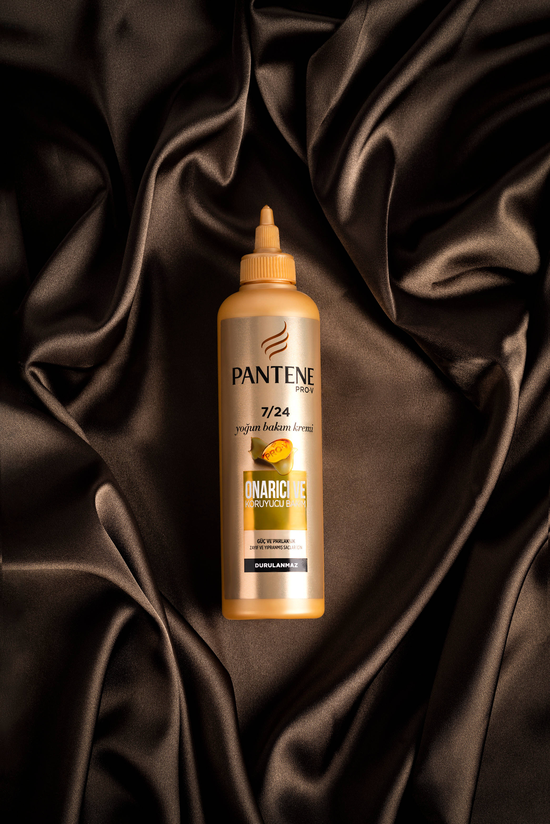 iPad Pro Pantene на коричневой ткани Обои