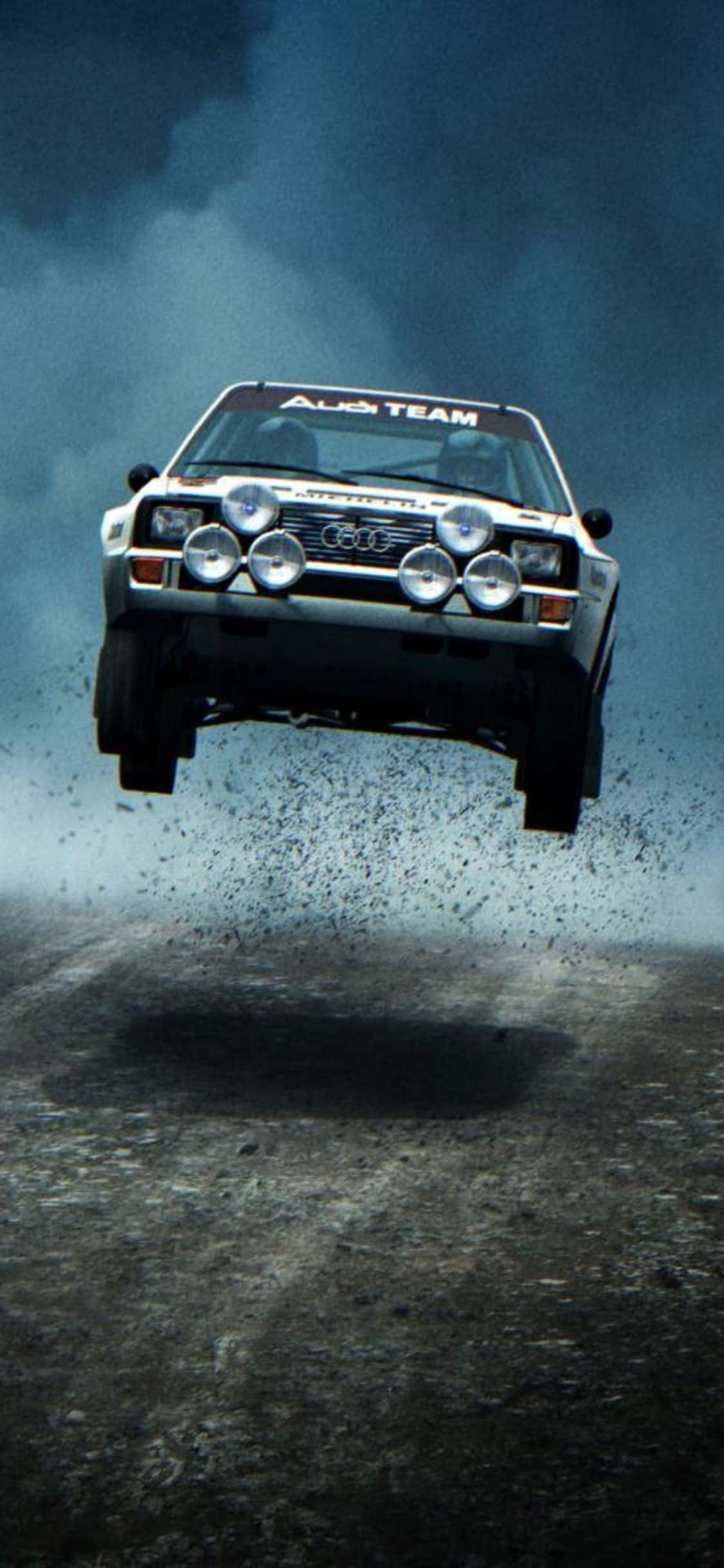 Почувствуйте прилив эмоций с iPhone Xs Dirt Rally Обои