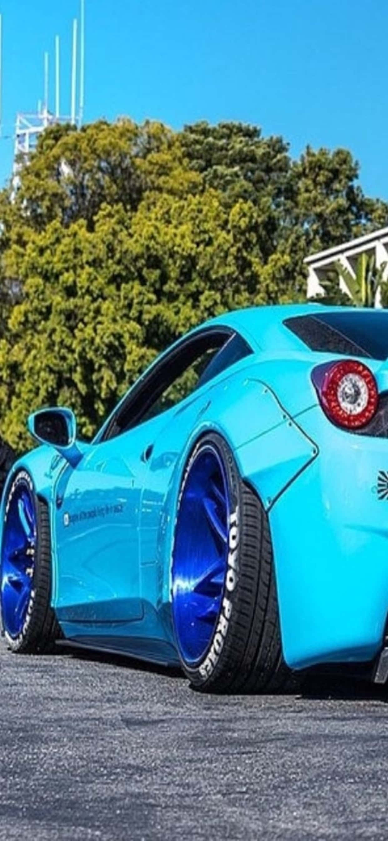 Фон iPhone Xs Max Ferrari Светло-голубая Ferrari 458 Обои