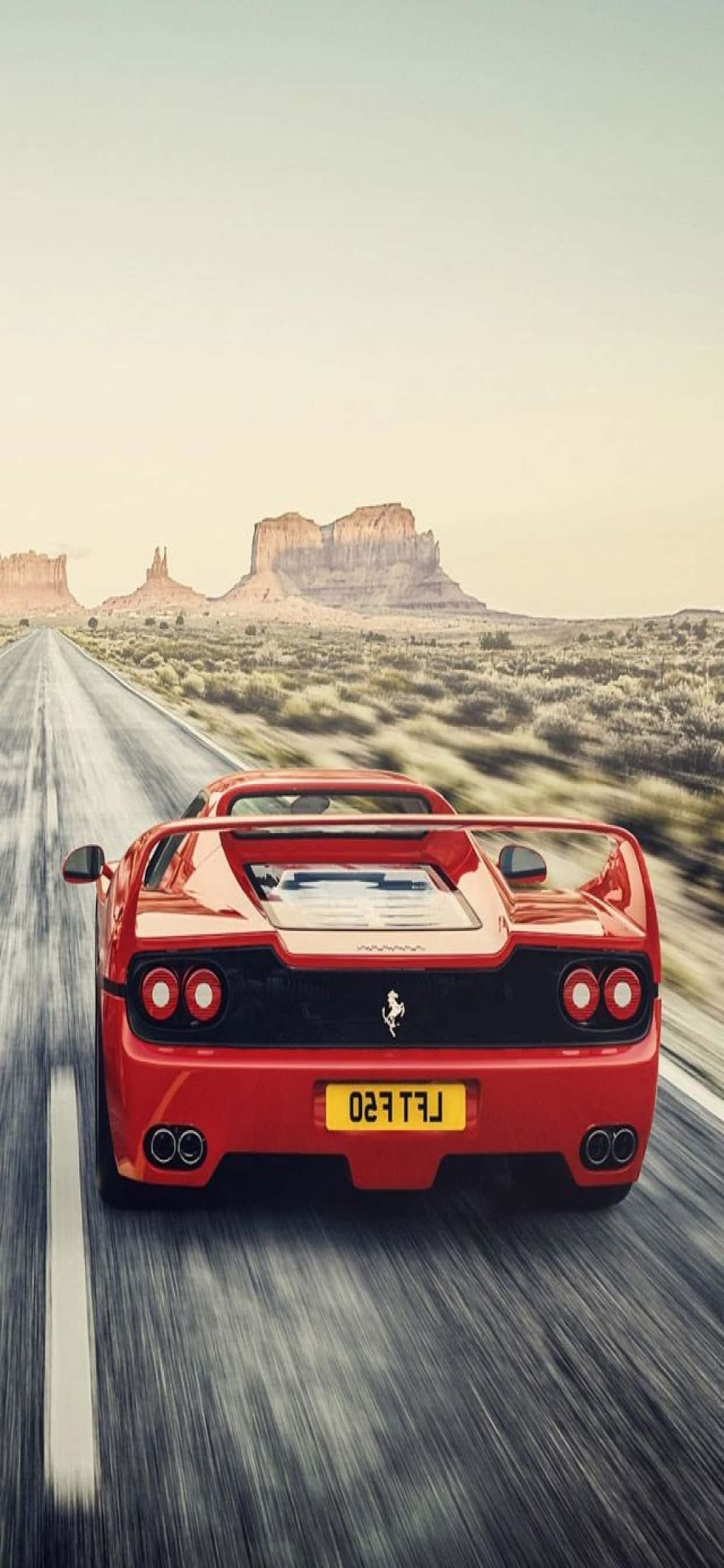 iPhone Xs Max Ferrari фон красный Ferrari F50 на дороге Обои