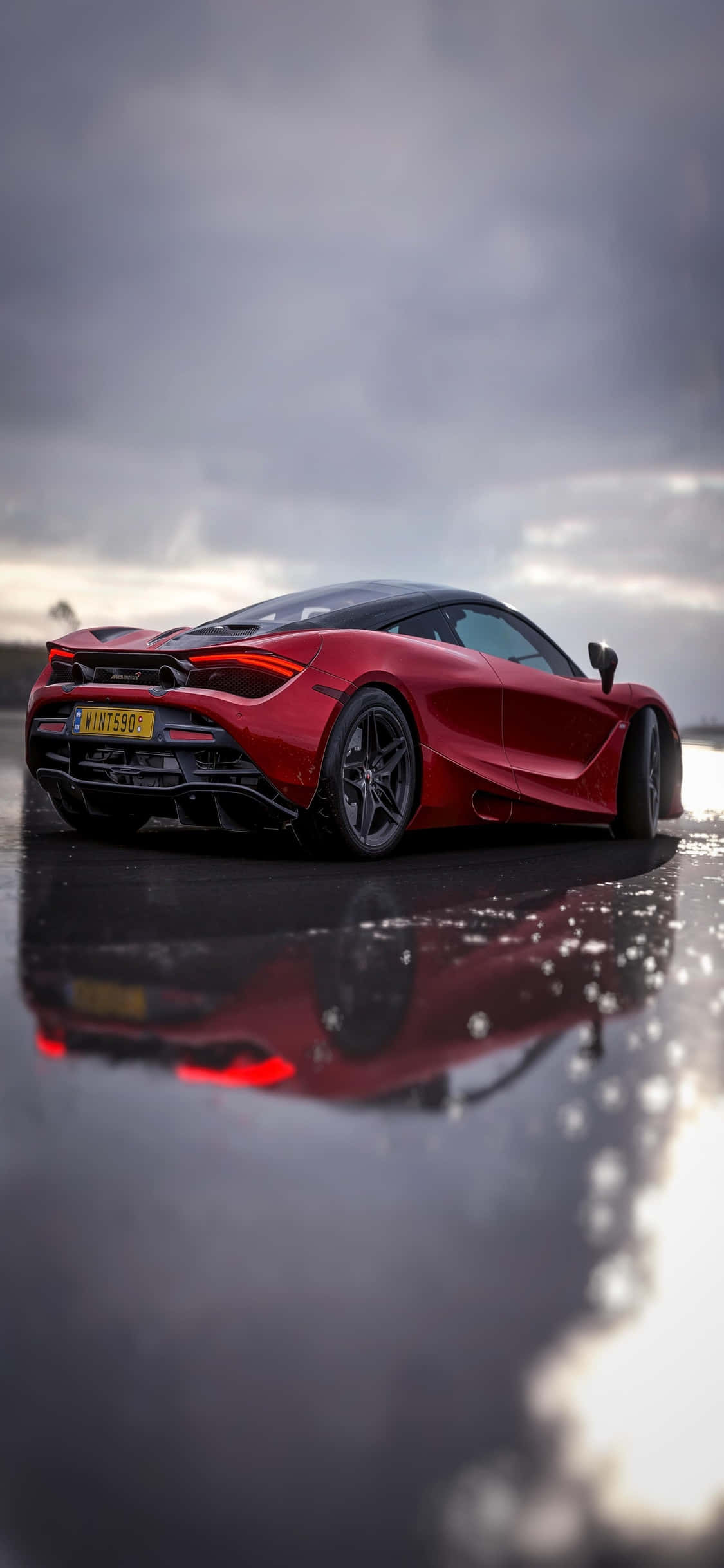 Почувствуйте скорость и роскошь iPhone Xs McLaren 720s Обои