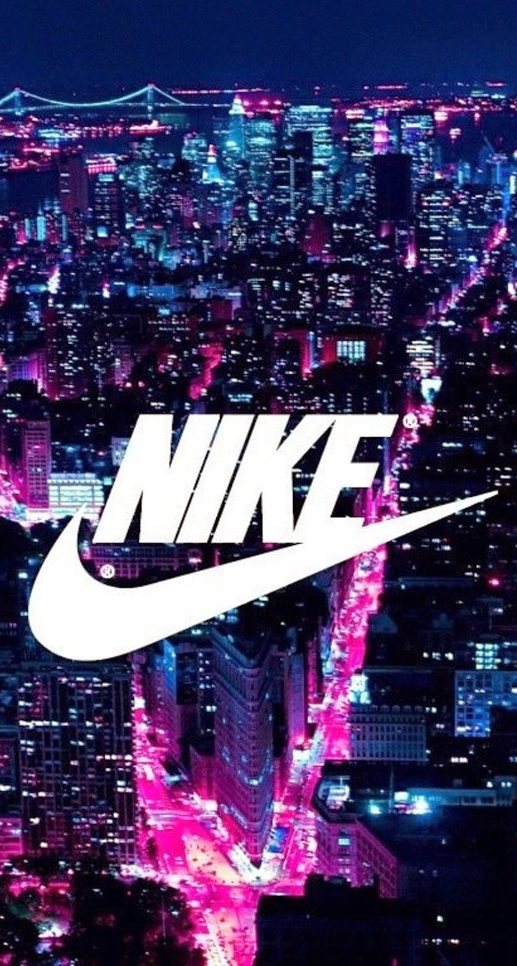 Крутой логотип Nike на фоне городского пейзажа Обои