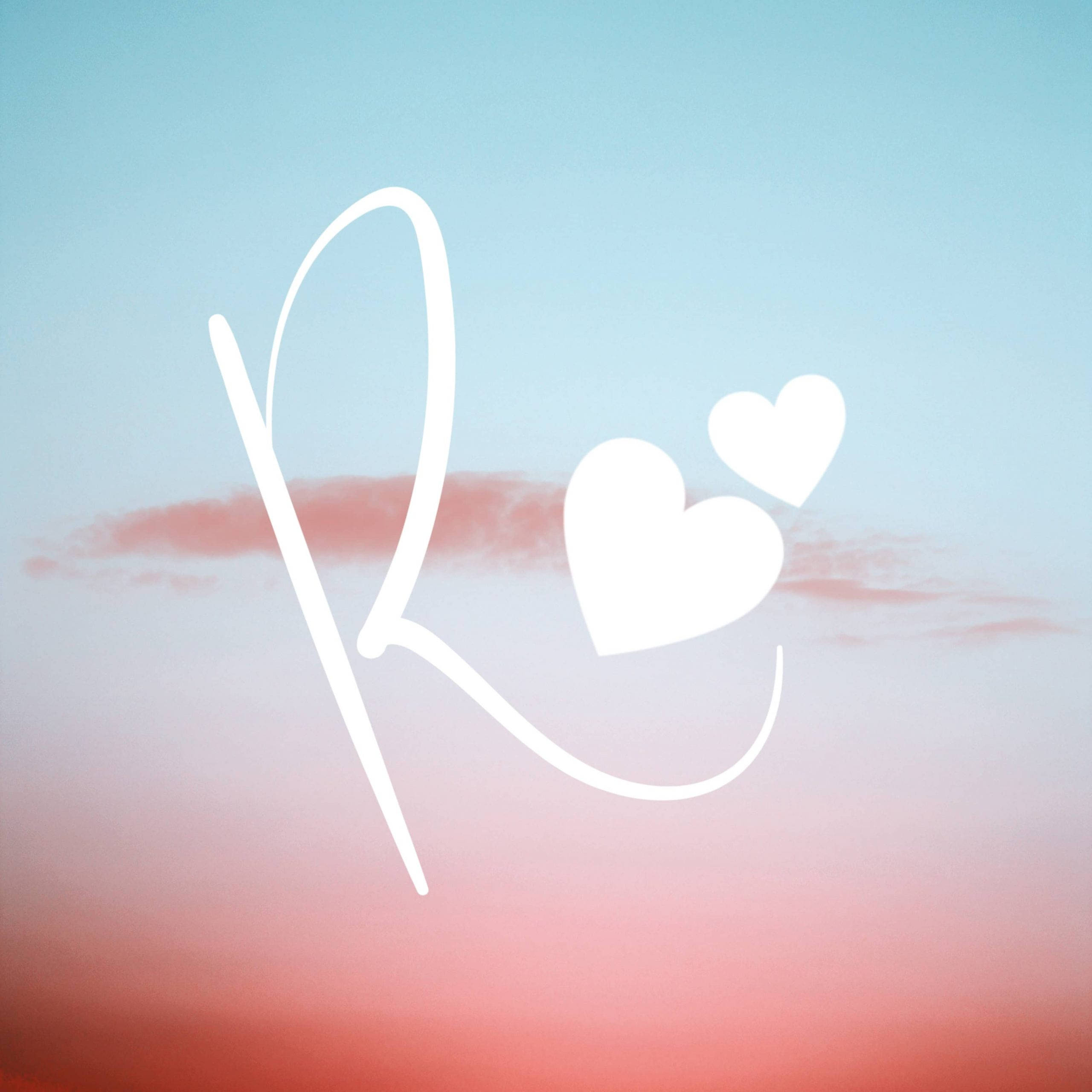 Имя R с завитками и закатом Обои