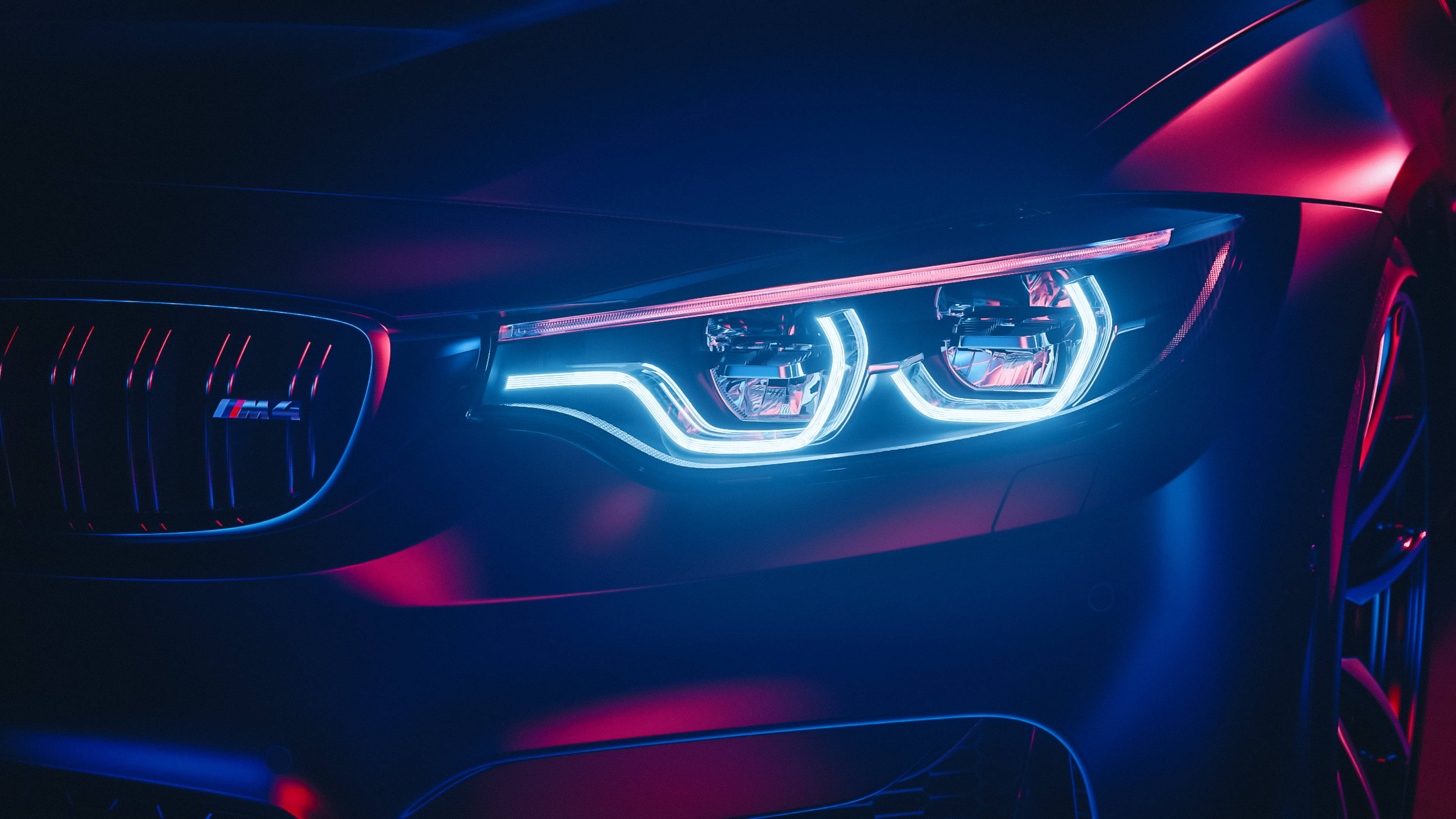 Близкий план ярких фар BMW M4 Обои