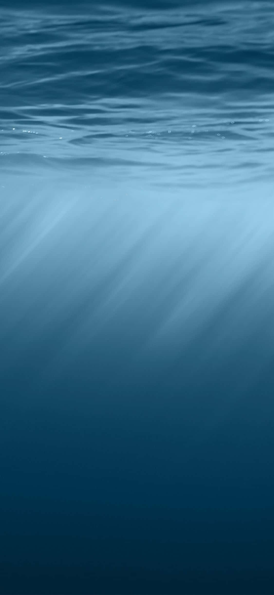 Будьте в курсе последних технологий с этим стильным Water iPhone Обои