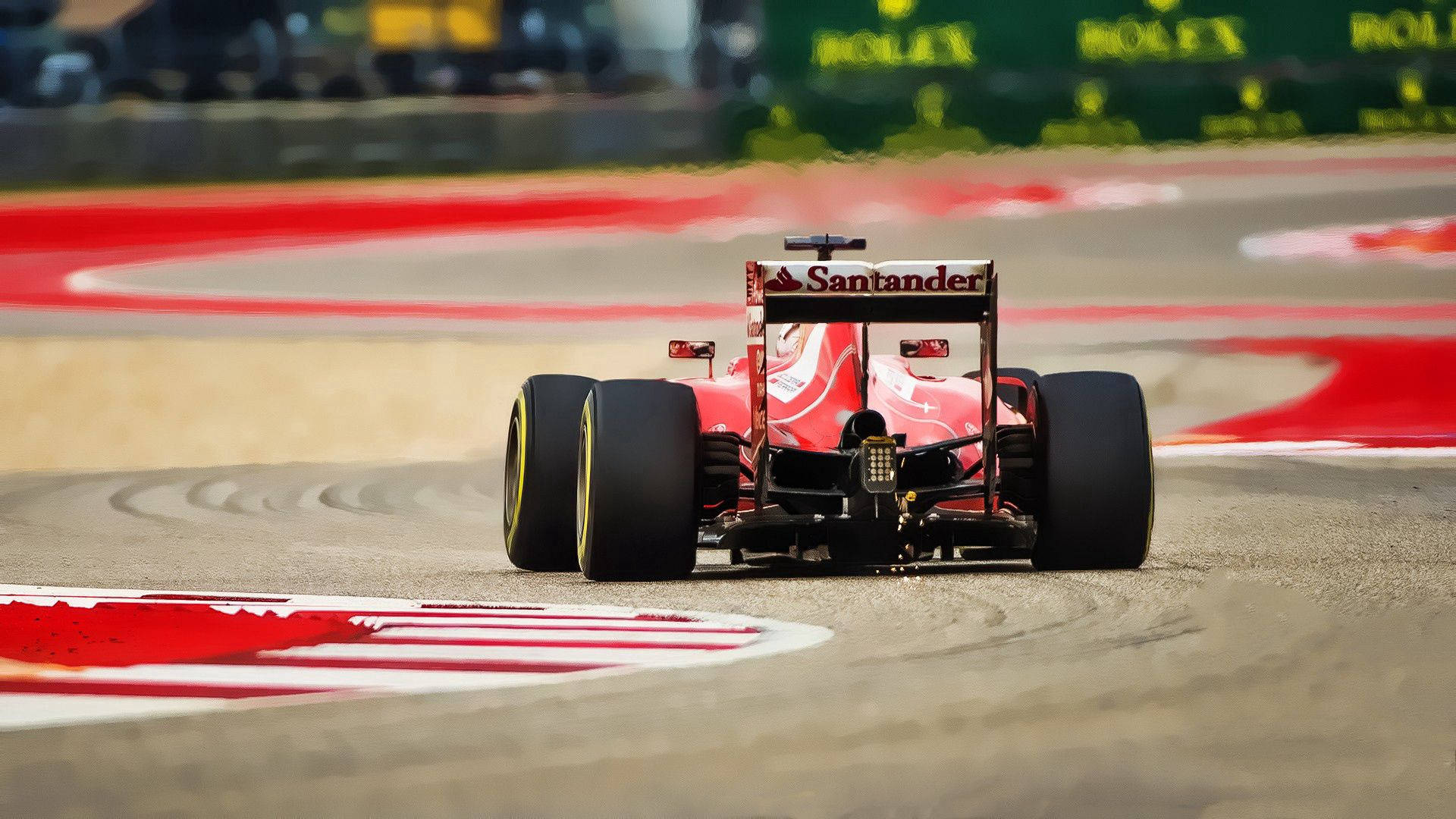 Обои с гоночным автомобилем Ferrari Formula 1 на трассе.