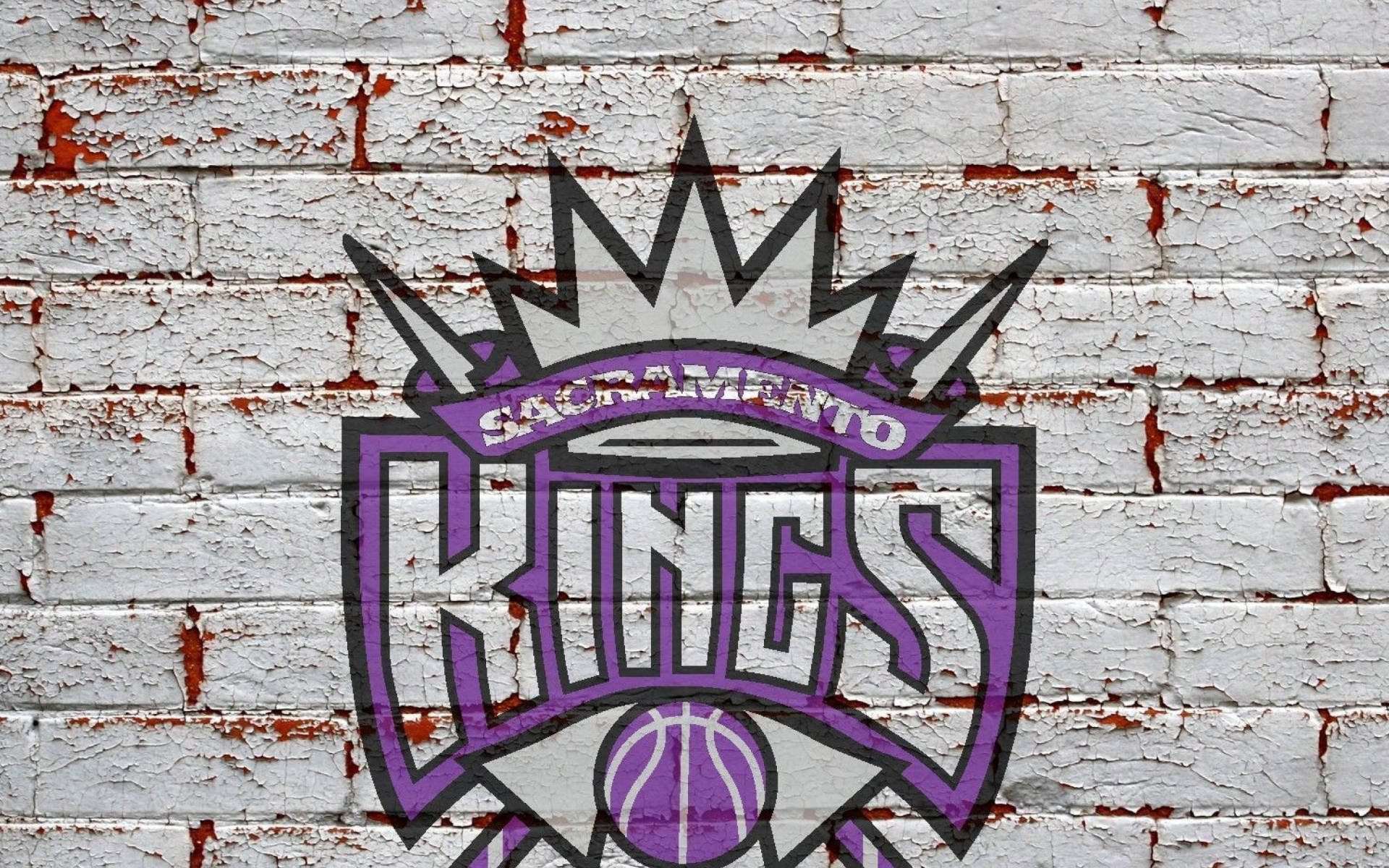Логотип Sacramento Kings на кирпичной стене Обои