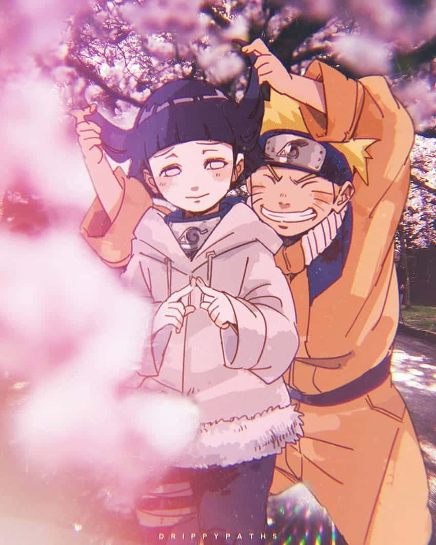 Милые Наруто и Хината в парке цветущей сакуры Обои