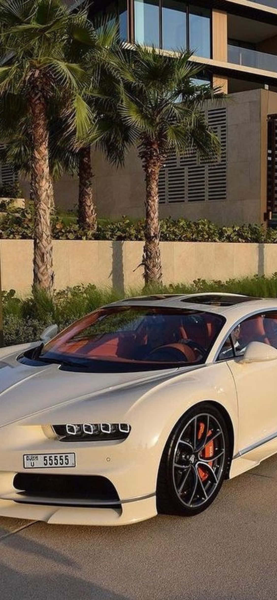 Оптимизированная роскошь: iPhone XS и Bugatti Veyron — идеальное сочетание для роскошного образа жизни Обои