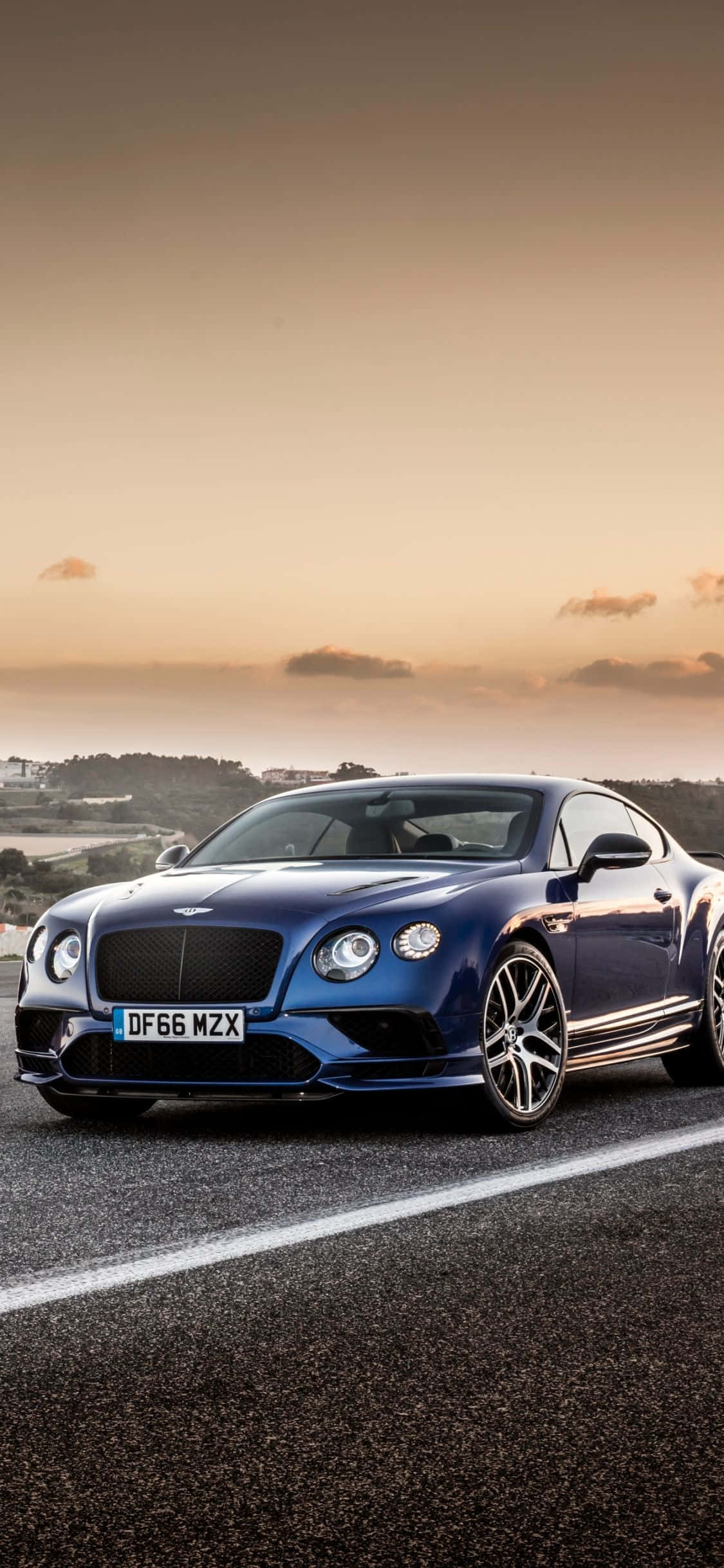 Припаркованный синий Bentley iPhone Обои