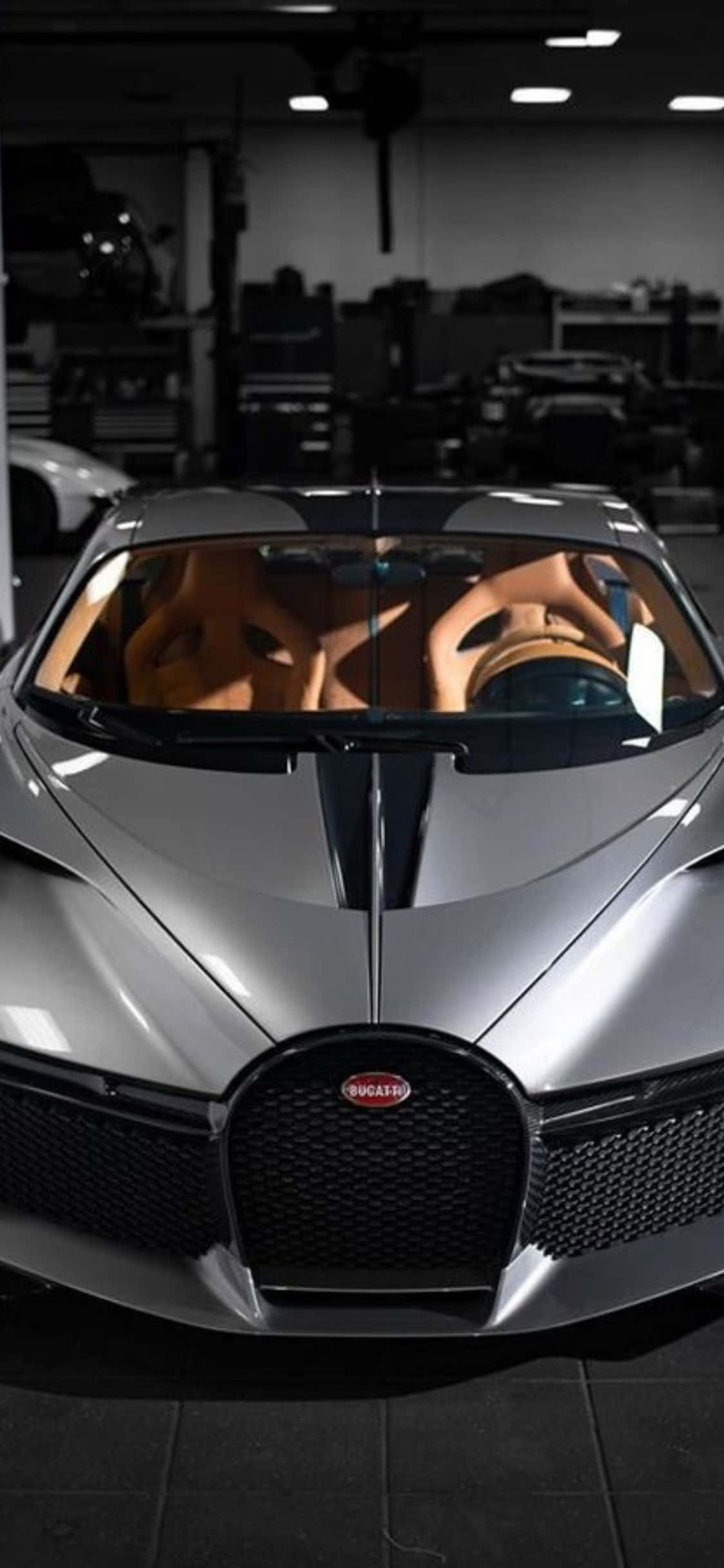 Уникальная роскошь: исследуйте мир с персонализированным iPhone Xs и Bugatti Обои
