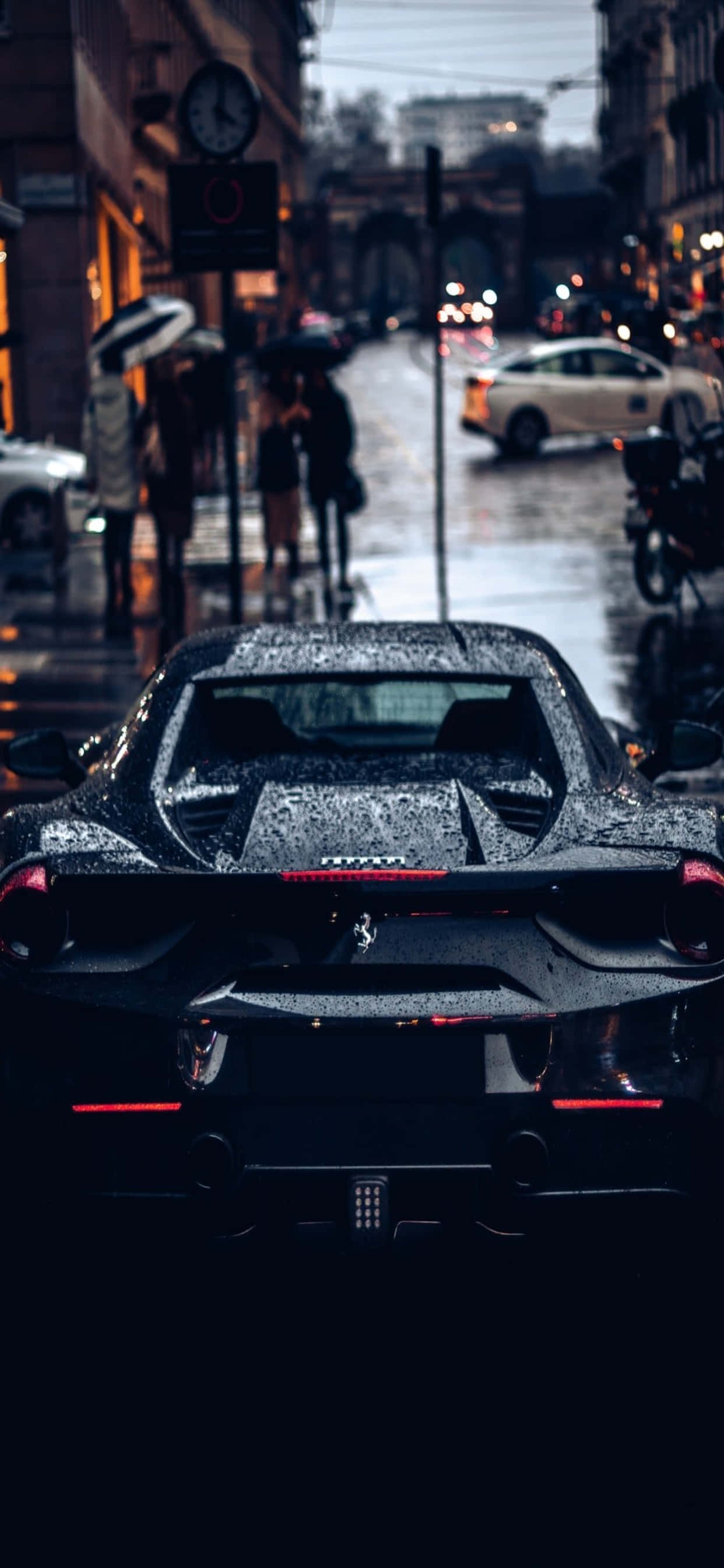 Фон iPhone Xs Max Ferrari Черная влажная Ferrari Обои
