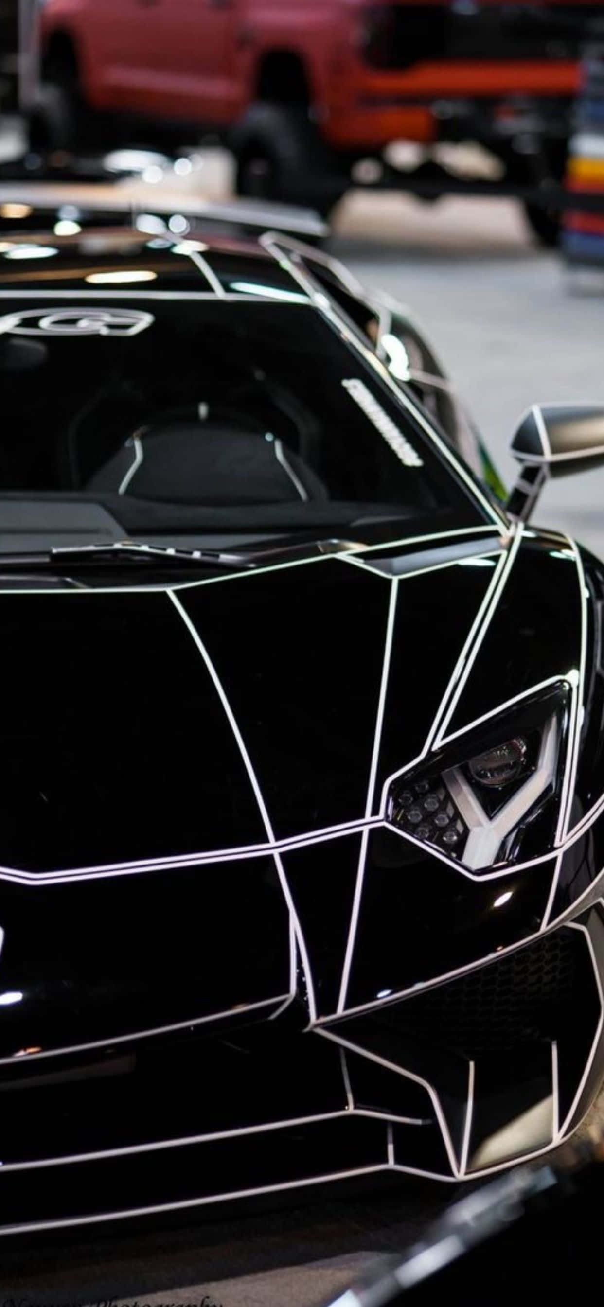 iPhone XS Max Lamborghini Глянцевый черный фон Обои