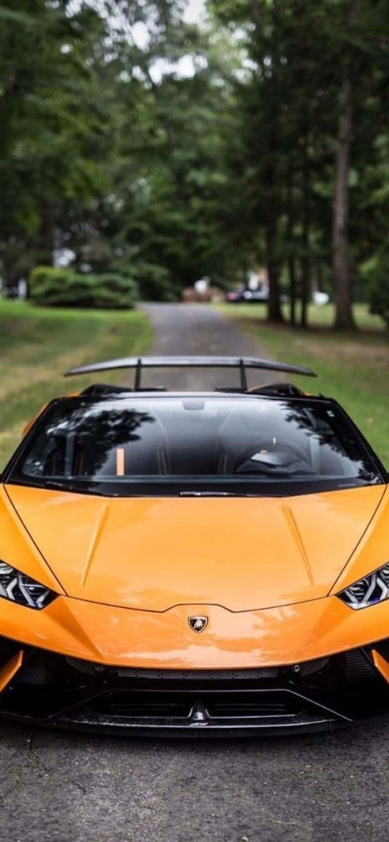 iPhone XS Max Lamborghini черный и оранжевый фон Обои