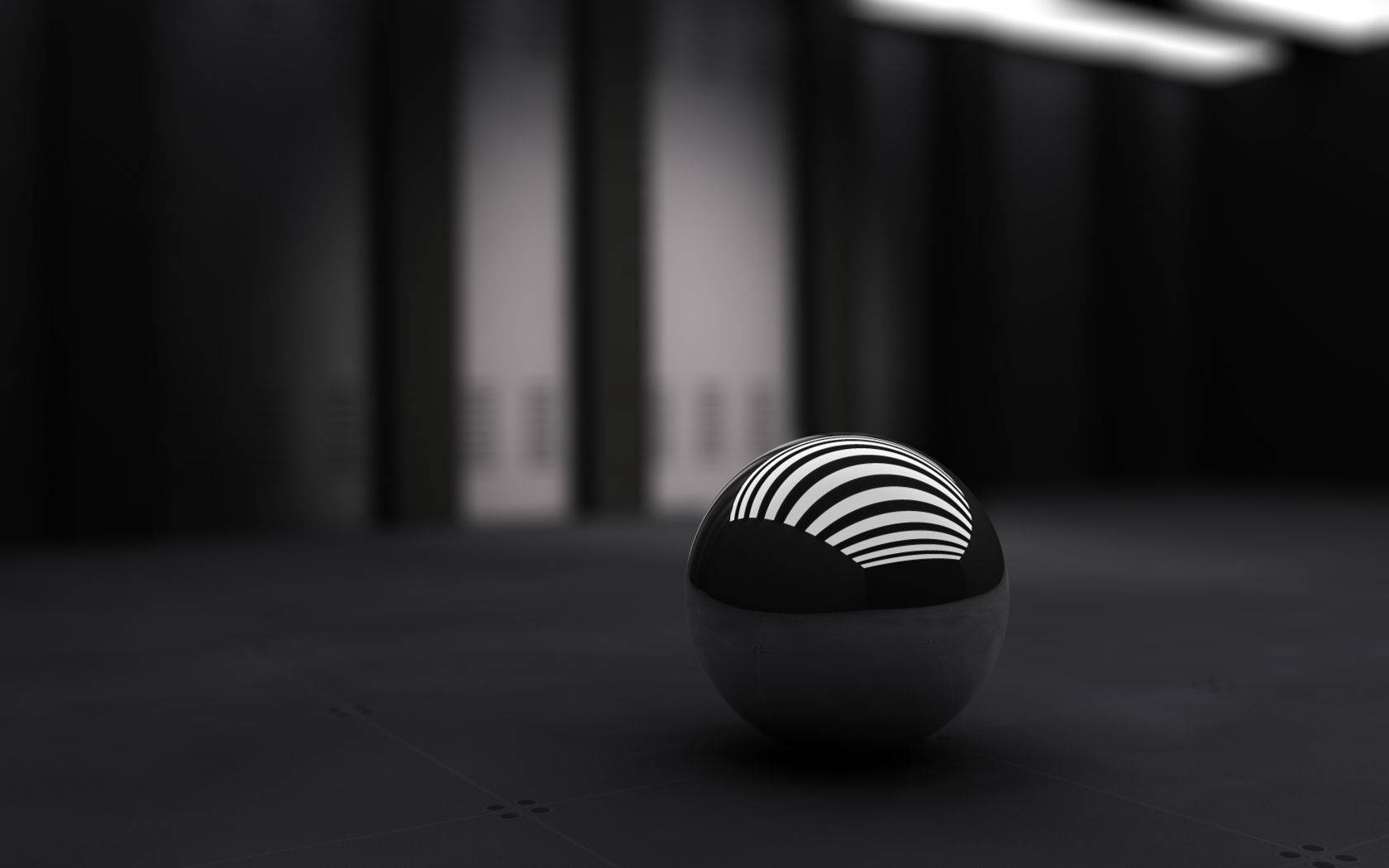 3D-обои для рабочего стола с маленьким черным шаром.