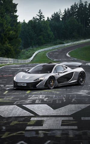 Белый спортивный автомобиль на трассе дрифта McLaren iPhone — Xiaomi Pad Mini Обои
