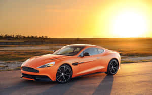 Захватывающий Aston Martin Vanquish в движении — MacBook Pro 13 Обои