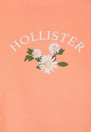 Обои с иллюстрацией Hollister с тремя белыми цветами — OnePlus Pad 3 Обои