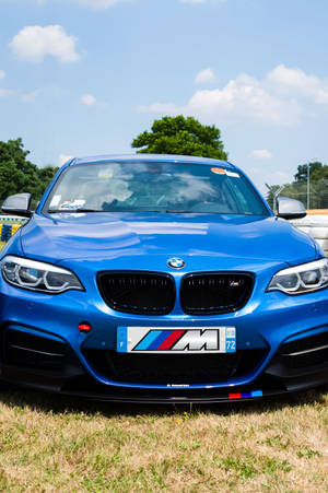 Красивый синий BMW на гоночной трассе — Xiaomi Pad Обои