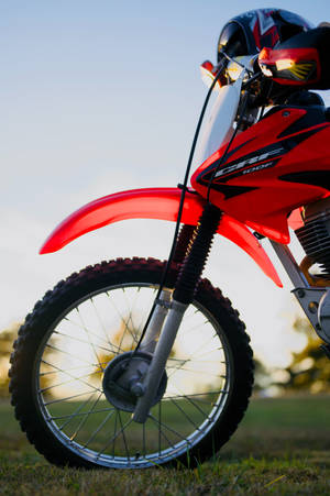 Красный мотоцикл Honda CRF100 — Xiaomi Pad 8 Обои