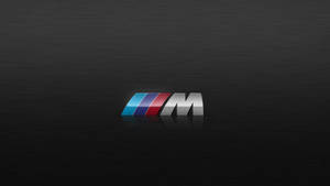 Логотип BMW M на черной текстуре дерева — Bmw Обои