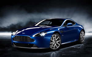 Потрясающий Aston Martin DB9 в движении по живописному маршруту — Steam Deck OLED Обои