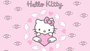 Розовое сердечко Hello Kitty с крыльями