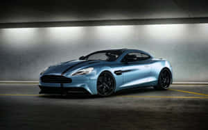 Стремительный Aston Martin Vanquish в движении — 1280x800 Обои