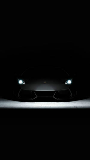 Черный эстетичный Lamborghini с белыми фарами для iPhone — Крутые машины гиф Обои
